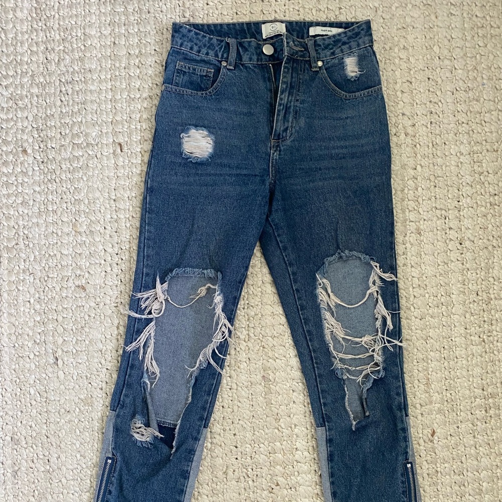 Cool denim ripped jeans from Cotton On with zipper detail at the ankles.